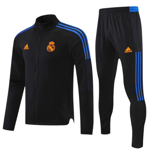 KIT CHAQUETA CON CREMALLERA NEGRO-NARANJA + CHÁNDAL REAL MADRID 2021