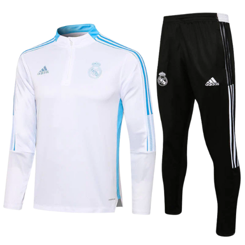 KIT CHAQUETA CON CREMALLERA BLANCA Y AZUL + CHÁNDAL REAL MADRID 2021